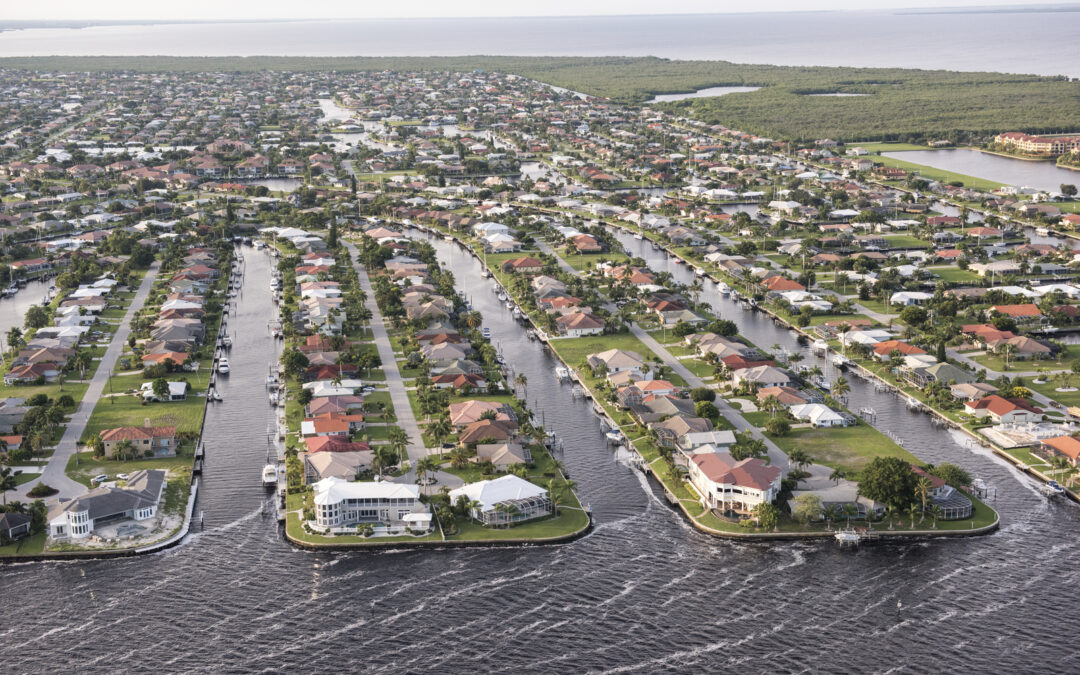 Aerial photography of Punta Gorda, on Florida’s Gulf of Mexico coast at the north end of Charlotte Harbor near the mouth of the Peace River. Coastal development is situated very close to the river and bay, near where Hurricane Charley made impact in 2005.